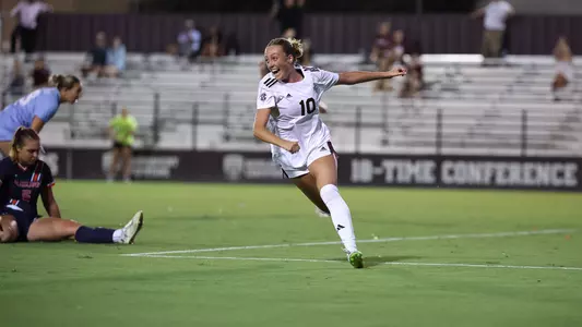 Grace Ivey smiles from ear-to-ear while the Auburn goalkeeper and a defender ponder what had happened after an Ivey goal.