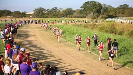 COLLEGE STATION, TX - September 13, 2024 - Penelope Gracey of the Texas A&M Aggies and Kristen McHugh of the Texas A&M Aggies during the Texas A&M Invitational at Watts Cross Country Course in College Station, TX. Photo By Jonathan Taffet/Texas A&M Athletics