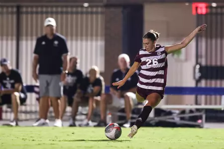 Leah Pirro is in full back kick as she winds to unleash a free kick at SMU