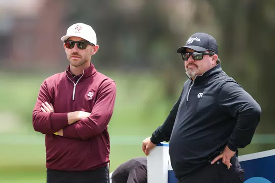 Carlsbad, California - May 23, 2024 - Assistant Coach Matt Fast of the Texas A&M Aggies and Head Coach Brian Kortan of the Texas A&M Aggies during the NCAA Championship at OMNI La Costa Golf Course in Carlsbad, California. Photo By Sydney Stevenson/Texas A&M Athletics