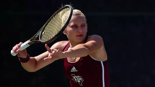 COLLEGE STATION, TX - April 13, 2025 - Daria Smetannikov of the Texas A&M Aggies during the game between the Georgia Bulldogs and the Texas A&M Aggies at Mitchell Tennis Center in College Station, TX. Photo By Julianne Shivers/Texas A&M Athletics