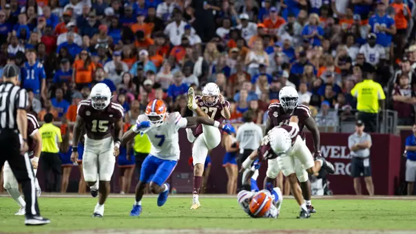 Tyler White punts against Florida