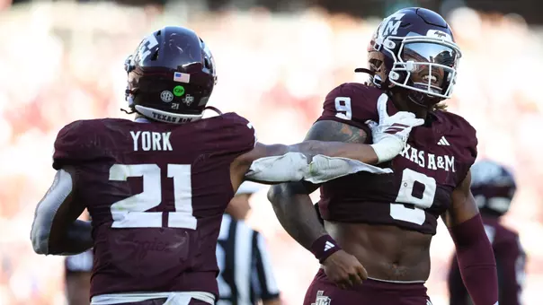 COLLEGE STATION, TX - September 27, 2025 - Defensive end Cashius Howell #9 of the Texas A&M Aggies and Linebacker Taurean York #21 of the Texas A&M Aggies during the game between the Auburn Tigers and the Texas A&M Aggies at Kyle Field in College Station, TX. Photo By Zoie Joslin/Texas A&M Athletics