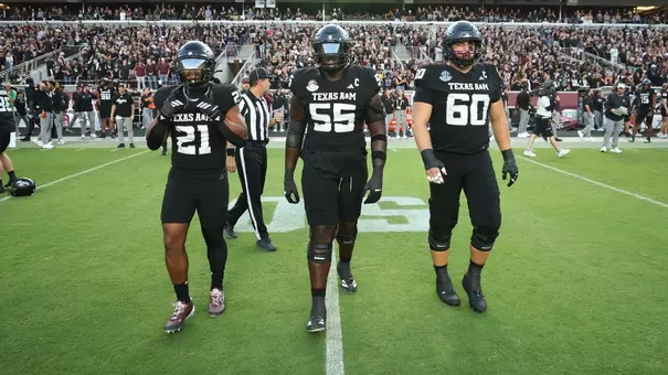 COLLEGE STATION, TX - October 04, 2025 - Linebacker Taurean York #21 of the Texas A&M Aggies and Offensive lineman Ar'maj Reed-Adams #55 of the Texas A&M Aggies and Offensive lineman Trey Zuhn III #60 of the Texas A&M Aggies during the game between the Mississippi St. Bulldogs and the Texas A&M Aggies at Kyle Field in College Station, TX. Photo By Evan Pilat/Texas A&M Athletics