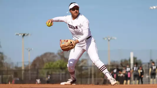 Clearwater, Florida - February 14, 2025 - Larisa Perez #15 of the Texas A&M Aggies during the game between the UCF Knights and the Texas A&M Aggies at Eddie C. Moore Fields in Clearwater, Florida. Photo By Evan Pilat