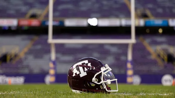 Maroon Helmet on turf at Tiger Stadium