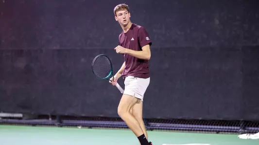 COLLEGE STATION, TX - February 23, 2025 - Lathan Skrobarcek of the Texas A&M Aggies during the game between the Lamar Cardinals and the Texas A&M Aggies at Mitchell Tennis Center in College Station, TX. Photo By Julianne Shivers/Texas A&M Athletics