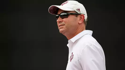 COLLEGE STATION, TX - May 06, 2023 - Head Coach Mark Weaver of the Texas A&M Aggies during the second round of the NCAA Tournament Women's Tennis game between the Baylor Bears and the Texas A&M Aggies at Mitchell Tennis Center in College Station, TX. Photo By Craig Bisacre/Texas A&M Athletics