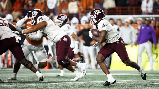 AUSTIN, TX - November 28, 2025 - Running back Rueben Owens II #4 of the Texas A&M Aggies during the game between the Texas Longhorns and the Texas A&M Aggies at Darrell K Royal?Texas Memorial Stadium in Austin, TX. Photo By Wesley Bowers