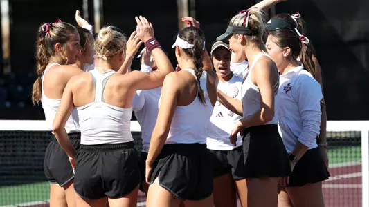 COLLEGE STATION, TX - February 02, 2025 - Women?s Tennis Team during the game between the Sam Houston St. Bearcats and the Texas A&M Aggies at Mitchell Tennis Center in College Station, TX. Photo By Bailee Wagner/Texas A&M Athletics