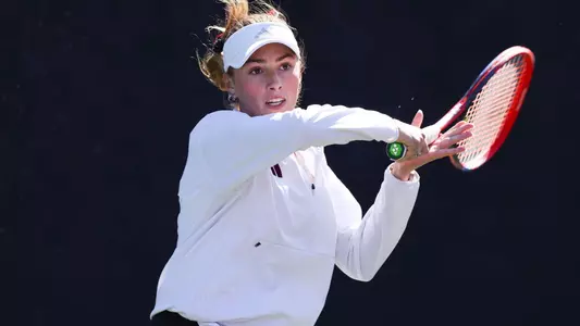 COLLEGE STATION, TX - February 16, 2025 - Lexington Reed of the Texas A&M Aggies during the game between the Pepperdine Waves and the Texas A&M Aggies at Mitchell Tennis Center in College Station, TX. Photo By Bailee Wagner/Texas A&M Athletics