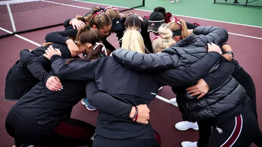 COLLEGE STATION, TX - January 25, 2025 - Texas A&M Aggie Women's Tennis Team during the game between the TCU Horned Frogs and the Texas A&M Aggies at Mitchell Tennis Center in College Station, TX. Photo By Julianne Shivers/Texas A&M Athletics