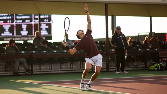 COLLEGE STATION, TX - February 23, 2025 - Tiago Pires of the Texas A&M Aggies during the game between the Lamar Cardinals and the Texas A&M Aggies at Mitchell Tennis Center in College Station, TX. Photo By Julianne Shivers/Texas A&M Athletics