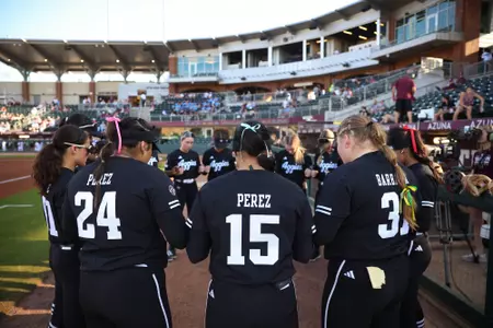 COLLEGE STATION, TX - February 08, 2025 - The Texas A&M Softball Team during the game between the Abilene Christian Wildcats and the Texas A&M Aggies at Davis Diamond in College Station, TX. Photo By Zoie Joslin/Texas A&M Athletics