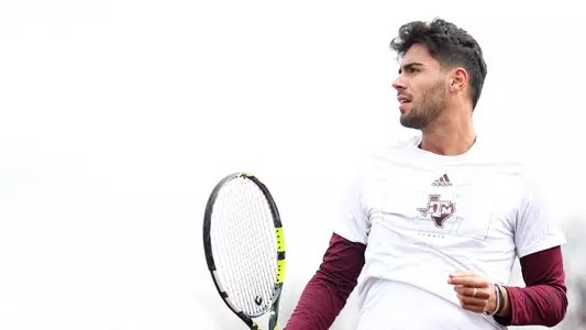 COLLEGE STATION, TX - February 23, 2025 - Togan Tokac of the Texas A&M Aggies during the game between the Florida State Seminoles and the Texas A&M Aggies at Mitchell Tennis Center in College Station, TX. Photo By Julianne Shivers/Texas A&M Athletics