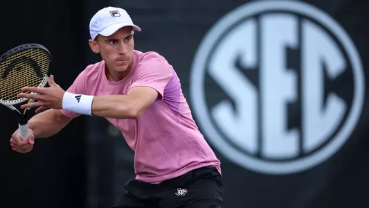 COLLEGE STATION, TX - March 08, 2025 - Theo Papamalamis of the Texas A&M Aggies during the game between the Florida Gators and the Texas A&M Aggies at Mitchell Tennis Center in College Station, TX. Photo By Julianne Shivers/Texas A&M Athletics