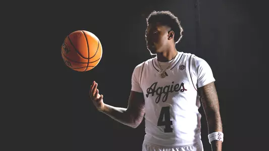 COLLEGE STATION, TX - October 08, 2024 - Guard Wade Taylor #4 of the Texas A&M Aggies during Texas A&M Aggies Men's Basketball photo day in College Station, TX. Photo By Rachel Mahan/Texas A&M Athletics