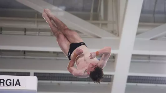 Jaxon Bowshire on platform at SEC Championships