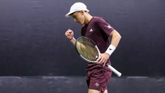 COLLEGE STATION, TX - March 06, 2025 - Theo Papamalamis of the Texas A&M Aggies during the game between the Auburn Tigers and the Texas A&M Aggies at Mitchell Tennis Center in College Station, TX. Photo By Julianne Shivers/Texas A&M Athletics