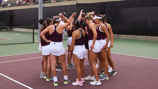 COLLEGE STATION, TX - March 23, 2025 - Texas A&M Aggie Women's Tennis Team during the game between the LSU Tigers and the Texas A&M Aggies at Mitchell Tennis Center in College Station, TX. Photo By Bailee Wagner/Texas A&M Athletics