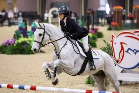 Mill Spring, North Carolina - March 29, 2025 - Kate Egan of the Texas A&M Aggies during the game between the Texas A&M Aggies and the South Carolina Gamecocks during the SEC Championship Final at Tryon International Equestrian Center in Mill Spring, North Carolina. Photo By Photographer Rachel Mahan/Texas A&M Athletics