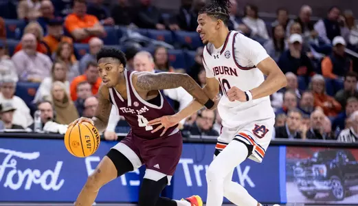 AUBURN, AL - January 09, 2024 - Guard Wade Taylor #4 of the Texas A&M Aggies during the Men's Basketball game between the Auburn Tigers and the Texas A&M Aggies at Auburn Arena in Auburn, AL. Photo By Craig Bisacre/Texas A&M Athletics
