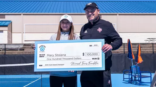 Mary Stoiana is going to need to find a bank with a big check to department for this grant she earned from the UTR Foundation part of winning the Hurd Award