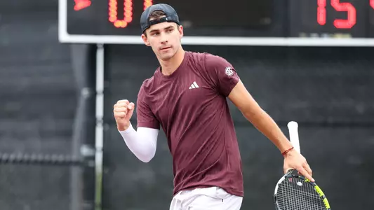 COLLEGE STATION, TX - April 05, 2025 - Luke Casper of the Texas A&M Aggies during the game between the Texas Longhorns and the Texas A&M Aggies at Mitchell Tennis Center in College Station, TX. Photo By Julianne Shivers/Texas A&M Athletics