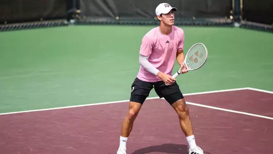COLLEGE STATION, TX - March 08, 2025 - Giulio Perego of the Texas A&M Aggies during the game between the Florida Gators and the Texas A&M Aggies at Mitchell Tennis Center in College Station, TX. Photo By Julianne Shivers/Texas A&M Athletics