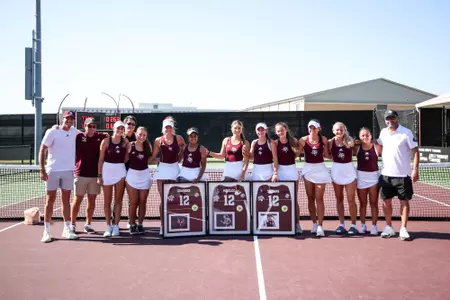 COLLEGE STATION, TX - April 13, 2025 - Texas A&M Aggie Women's Tennis Team during the game between the Georgia Bulldogs and the Texas A&M Aggies at Mitchell Tennis Center in College Station, TX. Photo By Julianne Shivers/Texas A&M Athletics