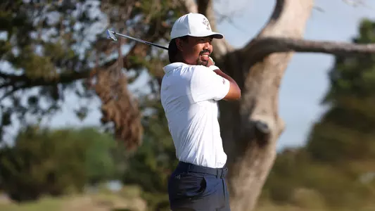 Phichaksn Maichon admires an iron shot during round 3 of the SEC Championship