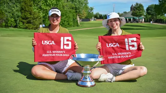 Natalie Yen and Asia Young pose with the trophy after winning the finals of the 2025 U.S. Women's Amateur Four-Ball at Oklahoma City Golf & Country Club in Nichols Hills, Okla. on Wednesday, May 14, 2025. (Ted Pio Roda/USGA)