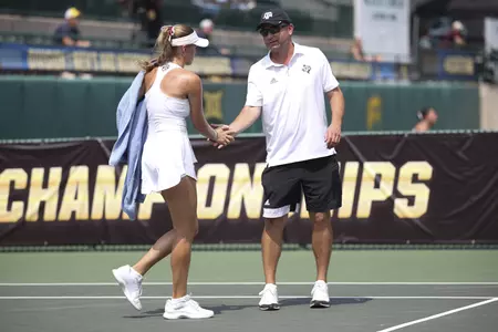WACO, TX - May 17, 2025 - Lexington Reed of the Texas A&M Aggies and Head Coach Mark Weaver of the Texas A&M Aggies during the NCAA Final Four game between the Texas A&M Aggies and the Michigan Wolverines at Hurd Tennis Center in Waco, TX. Photo By Chris Swann/Texas A&M Athletics