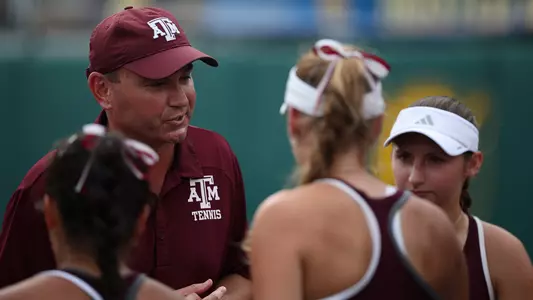 Coach Weaver talks to the squad during the NCAA Championship finals