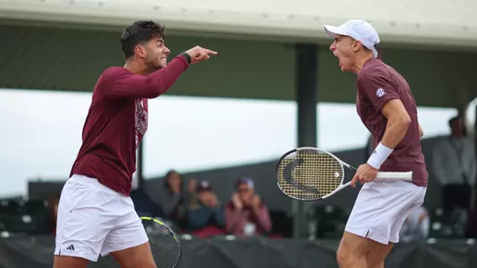 COLLEGE STATION, TX - April 05, 2025 - Togan Tokac of the Texas A&M Aggies and Theo Papamalamis of the Texas A&M Aggies during the game between the Texas Longhorns and the Texas A&M Aggies at Mitchell Tennis Center in College Station, TX. Photo By Micah Richter/Texas A&M Athletics