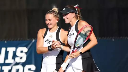 COLLEGE STATION, TX - May 03, 2025 - Daria Smetannikov of the Texas A&M Aggies and Lexington Reed of the Texas A&M Aggies during the game between the UC Santa Barbara Gauchos and the Texas A&M Aggies at Mitchell Tennis Center in College Station, TX. Photo By Julianne Shivers/Texas A&M Athletics
