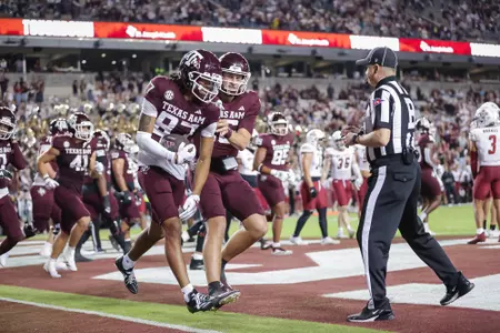 COLLEGE STATION, TX - November 16, 2024 - Wide receiver Ashton Bethel-Roman #87 of the Texas A&M Aggies, Quarterback Miles O'Neill #16 of the Texas A&M Aggies during the game between the New Mexico State Aggies and the Texas A&M Aggies at Kyle Field in College Station, TX. Photo By Ishika Samant/Texas A&M Athletics