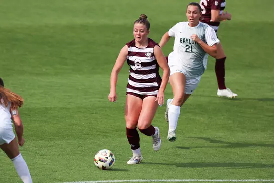 Bailey Cate on the dribble in a spring exhibition match against Baylor.
