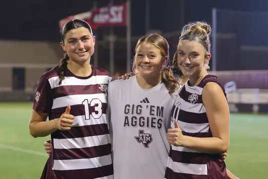 Defender Lucy Landherr, forward Bailey Cate and defender Riley Crooks #11 during the game against the Houston Cougars at Ellis Field