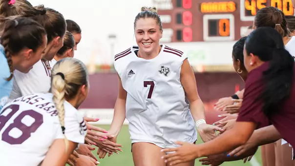 Kaylee Noble pregame hand slapping.