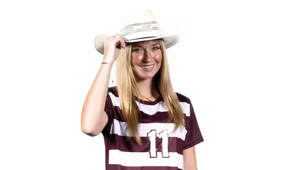 Riley Crooks gives a tip of her cowboy cap during her 2025 media day portrait shoot