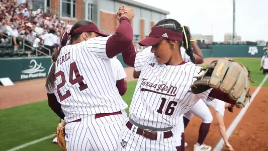 COLLEGE STATION, TX - April 27, 2025 - Mya Perez #24 of the Texas A&M Aggies and KK Dement #16 of the Texas A&M Aggies during the game between the Arkansas Razorbacks and the Texas A&M Aggies at Davis Diamond in College Station, TX. Photo By Sydney Stevenson/Texas A&M Athletics