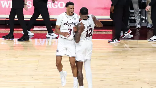Rylan Griffen and Rashaun Agee celebrating after a win