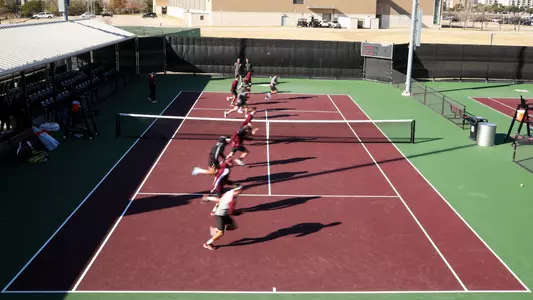COLLEGE STATION, TX - January 18, 2025 - Texas A&M Aggie Men's Tennis Team during the game between the UT San Antonio Roadrunners and the Texas A&M Aggies at Mitchell Tennis Center in College Station, TX. Photo By Sydney Stevenson/Texas A&M Athletics