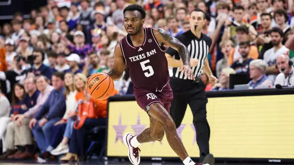 Jacari Lane bringing the ball up the court at Auburn