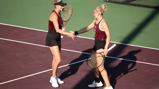 Daria Smetannikov and Lexington Reed celebrating a point.