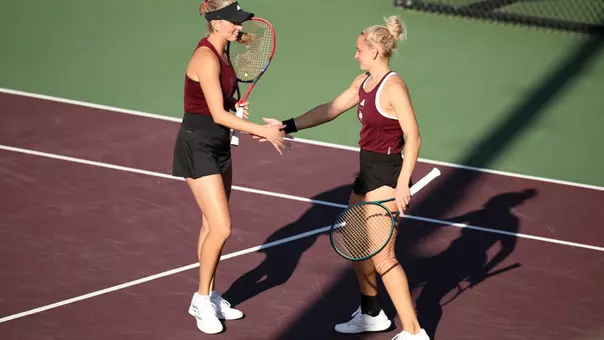 Daria Smetannikov and Lexington Reed celebrating a point.