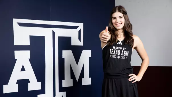 Ilinca Amariei posing for her media day headshot.