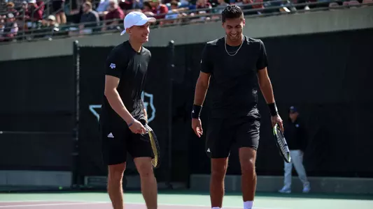 Theo and Togan high five