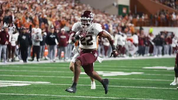AUSTIN, TX - November 28, 2025 - Running back EJ Smith #22 of the Texas A&M Aggies during the game between the Texas Longhorns and the Texas A&M Aggies at Darrell K Royal?Texas Memorial Stadium in Austin, TX. Photo By Evan Pilat